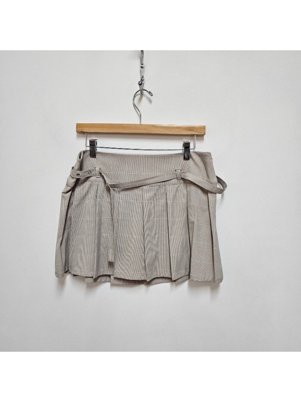 Leith pleated mini skort, featuring a subtle beige plaid pattern